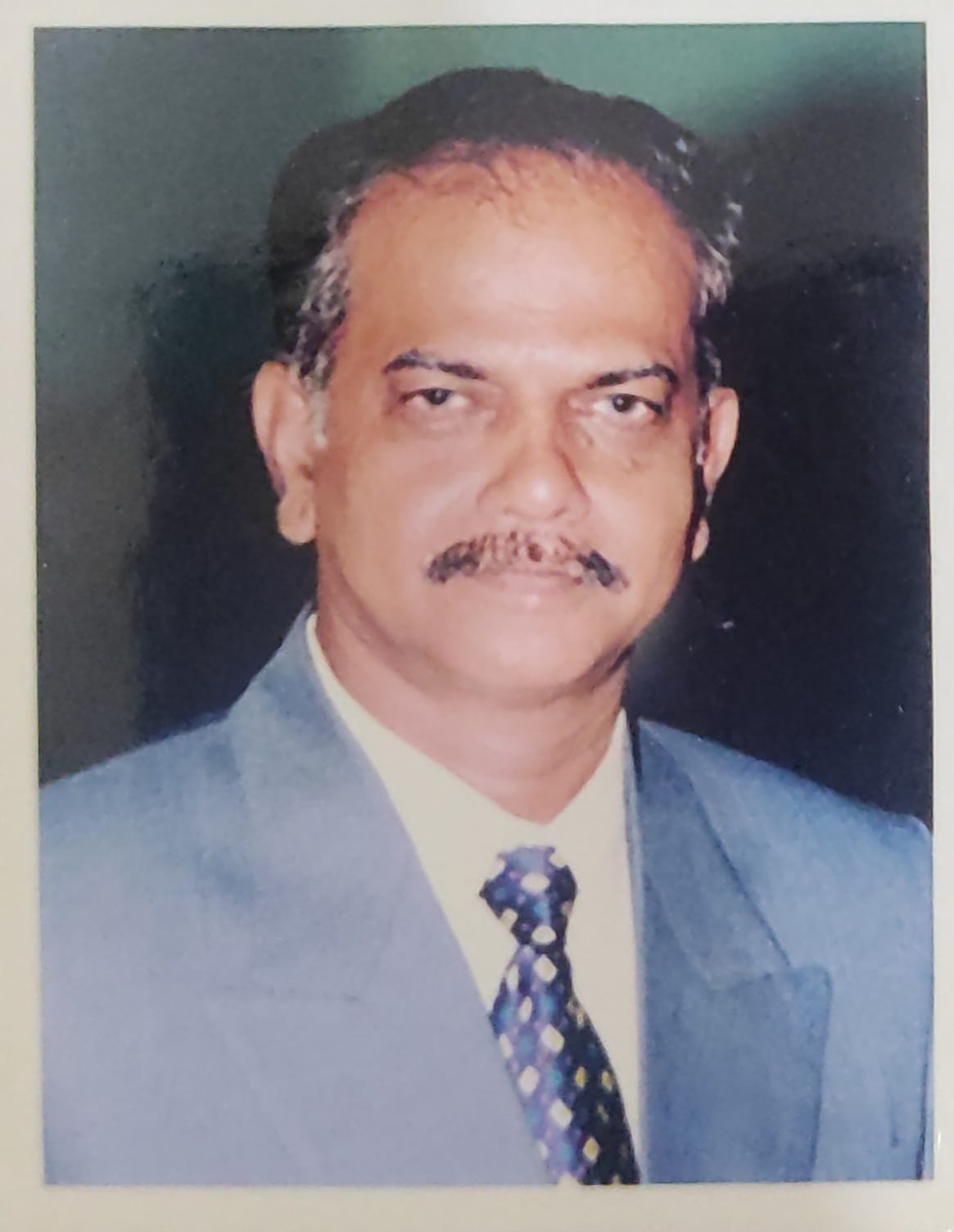 Dr R B Purushottam